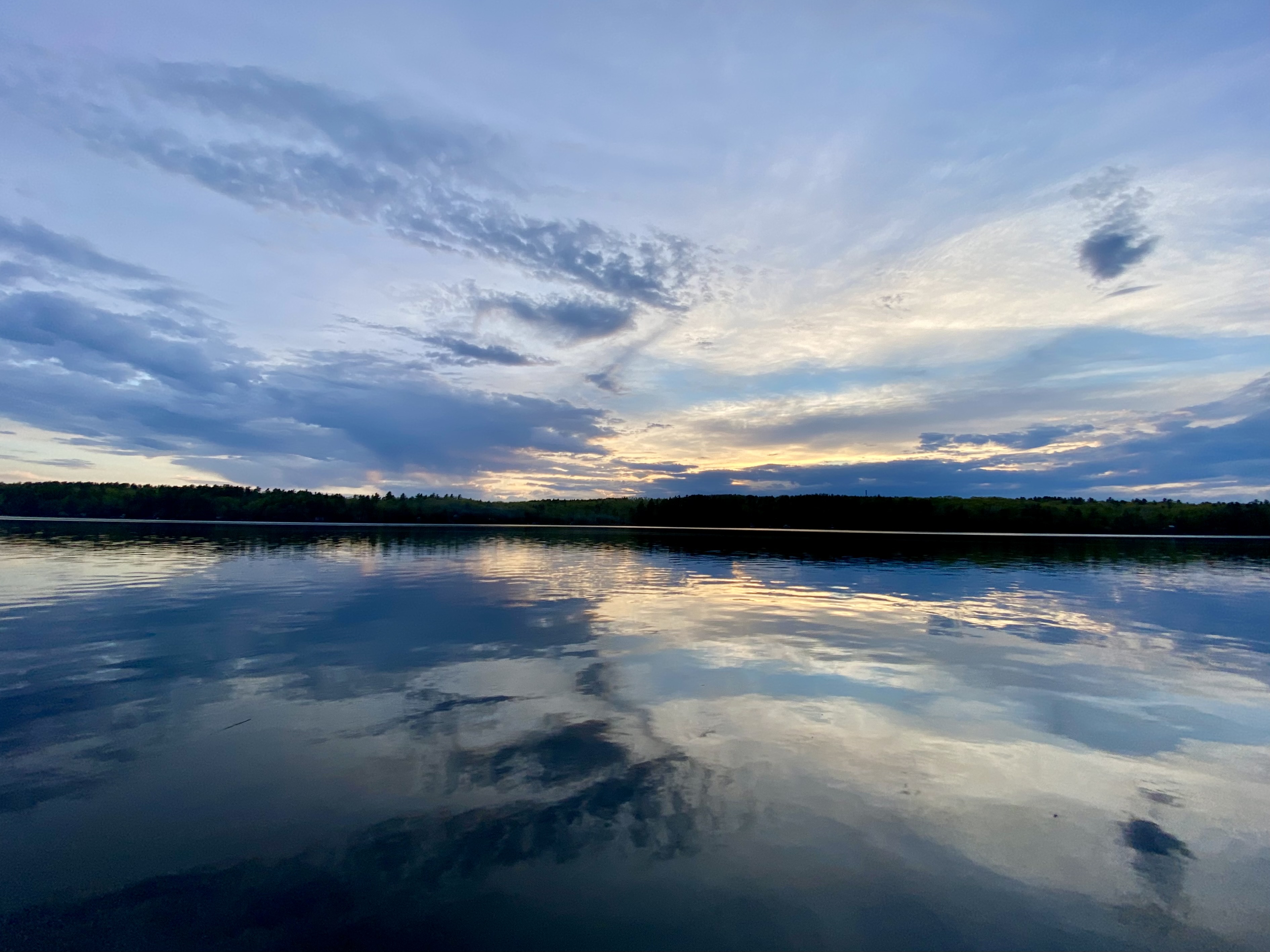 Cochnewagon Lake at sunset, clouds reflected in calm water